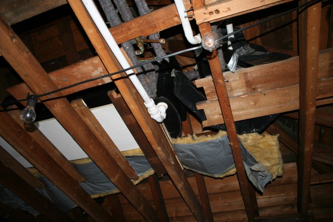 Cold water tank and lots of coming and going pipes