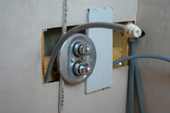 shower valve goes in