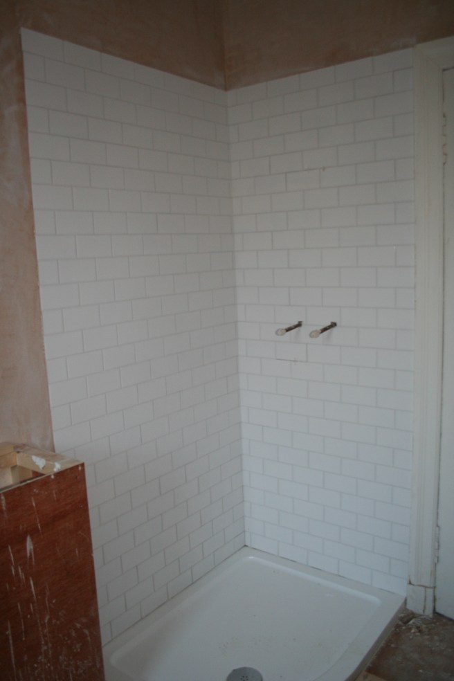 tiles on my bathroom wall at last, hooray
