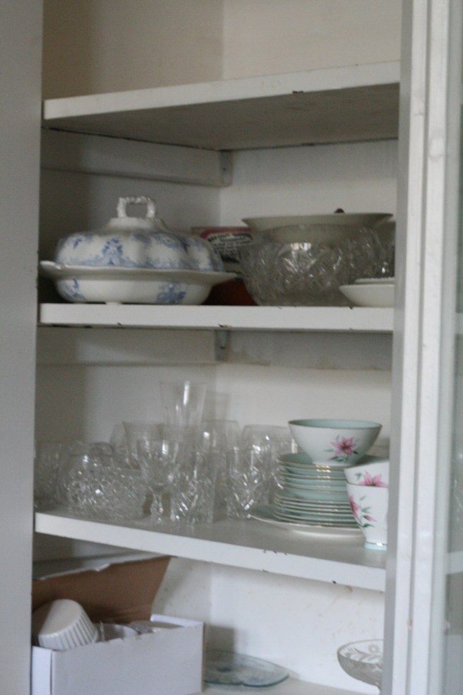 Dining room cupboard - filling up nicely.