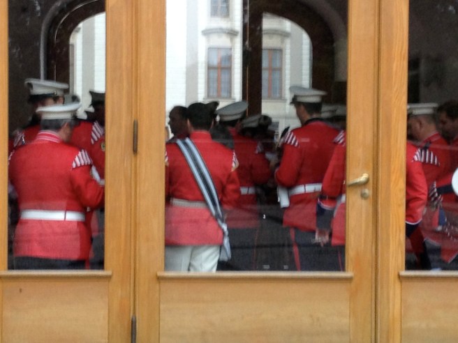 soldiers after being on parade in the heavy rain, they looked so happy to be inside
