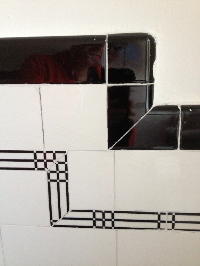 tiles in upstairs loo, would be black and white wouldn't they