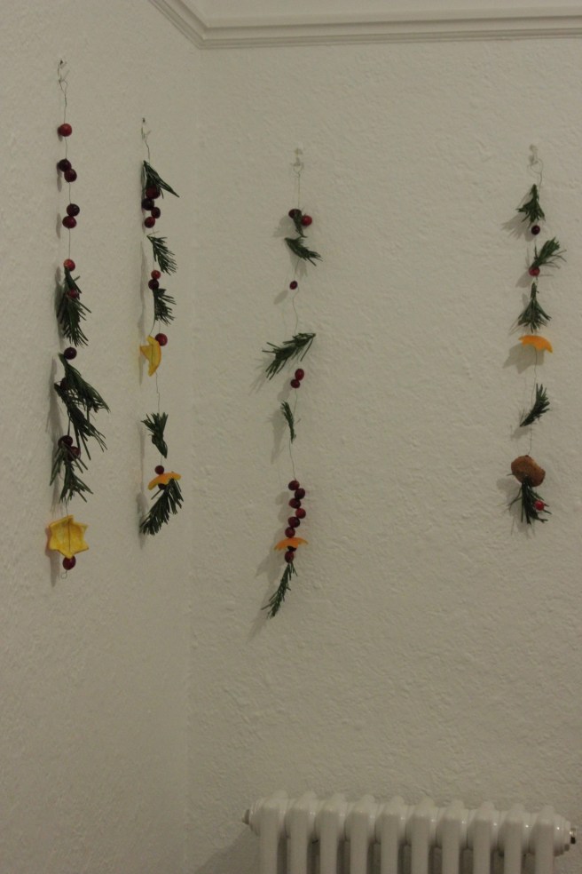 there they are on the wall in the hall, using hooks that are waiting to get their old pictures back.  like the radiator?