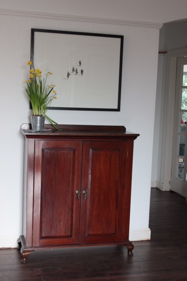 Tried this piece in the hall, too brown.